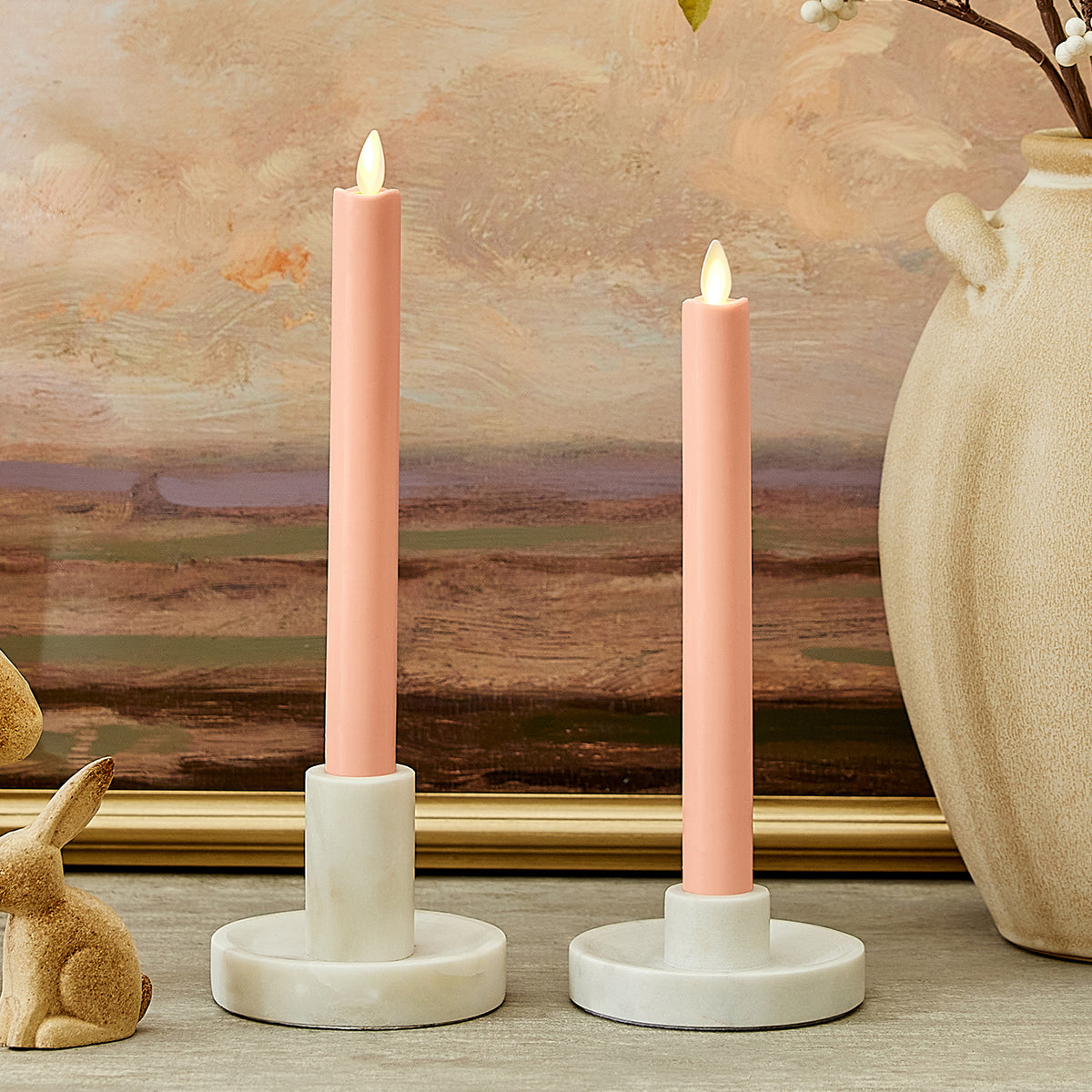 An image of Luminara's peach taper candles