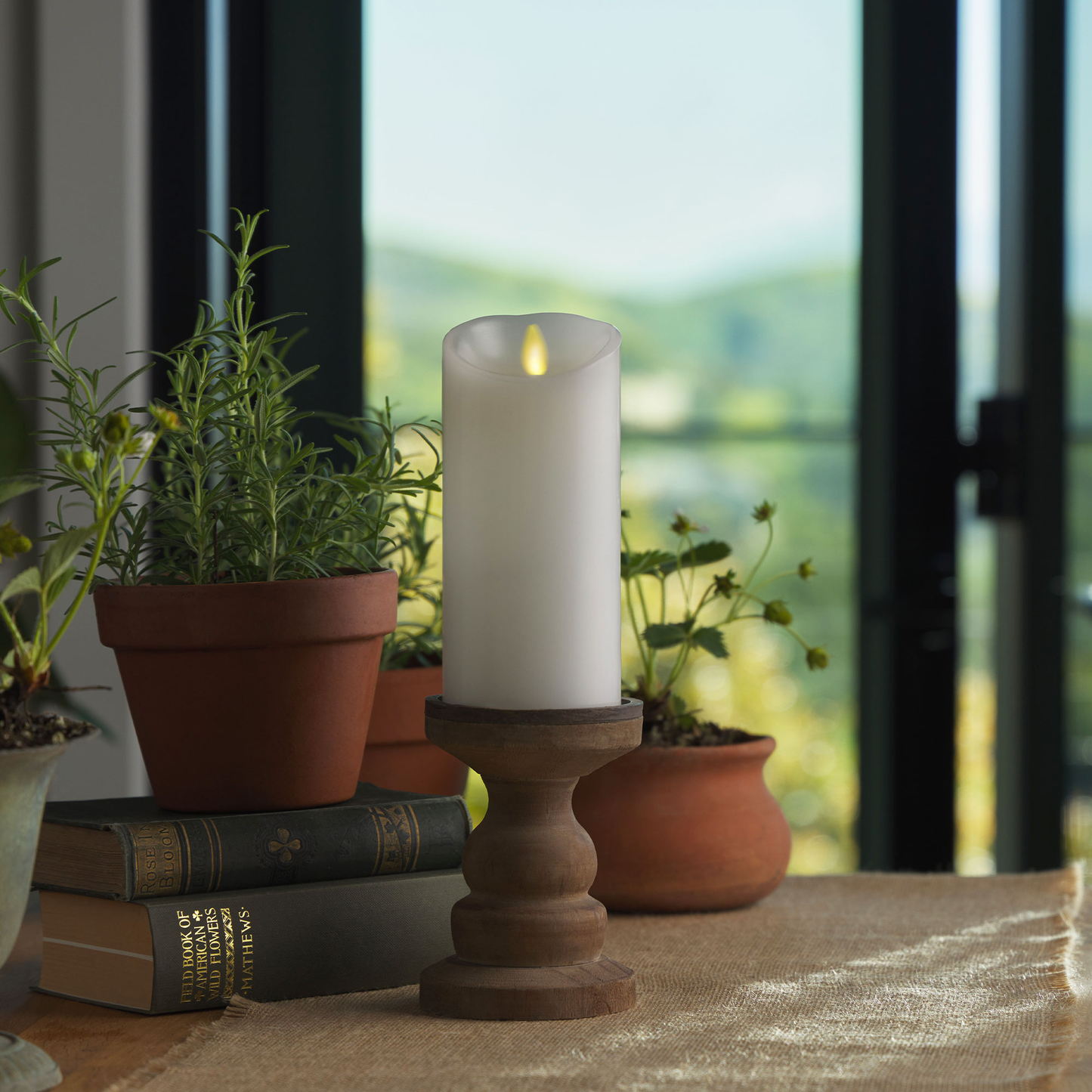 an image of Luminara's flameless white candle pillars