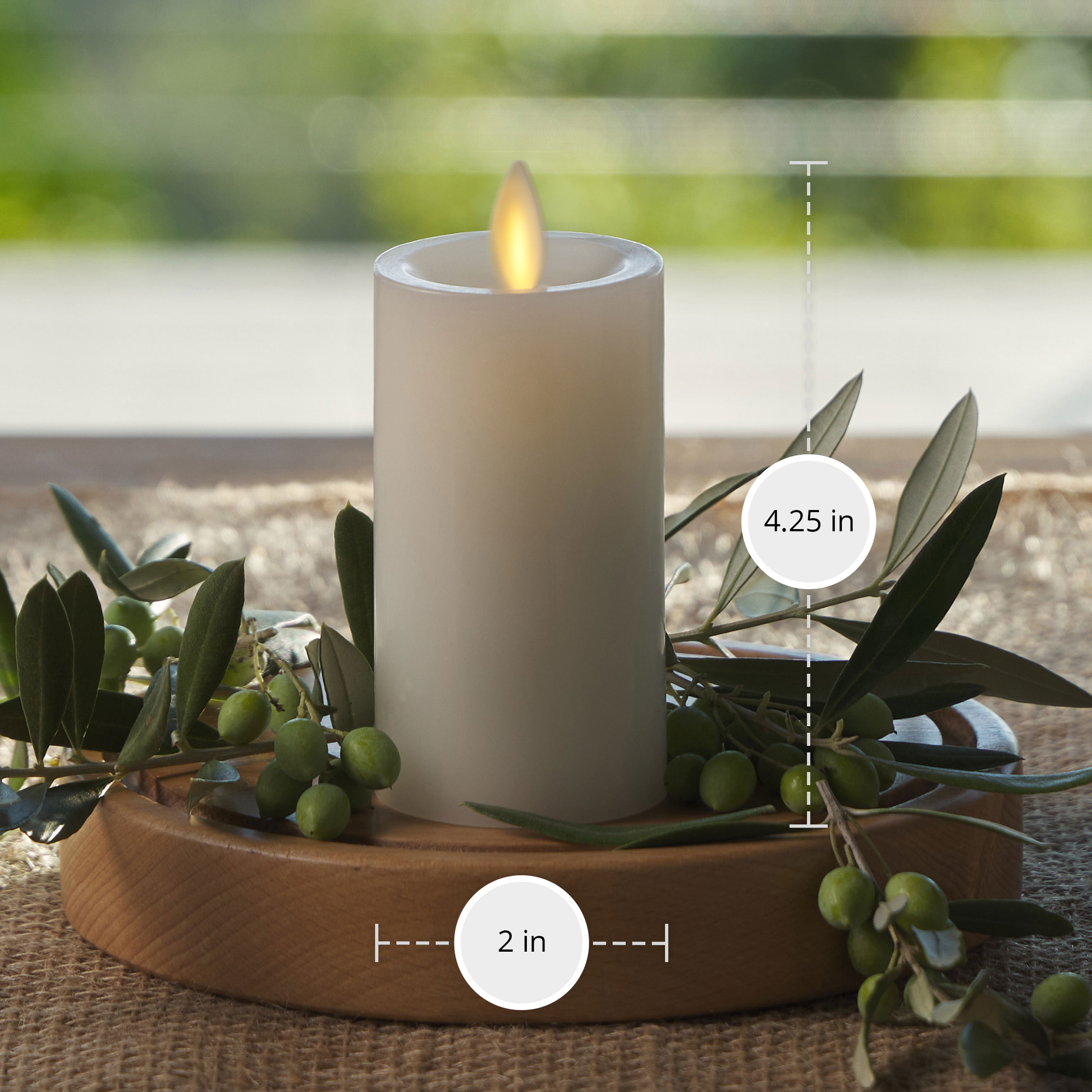 an image of our white Luminara candle