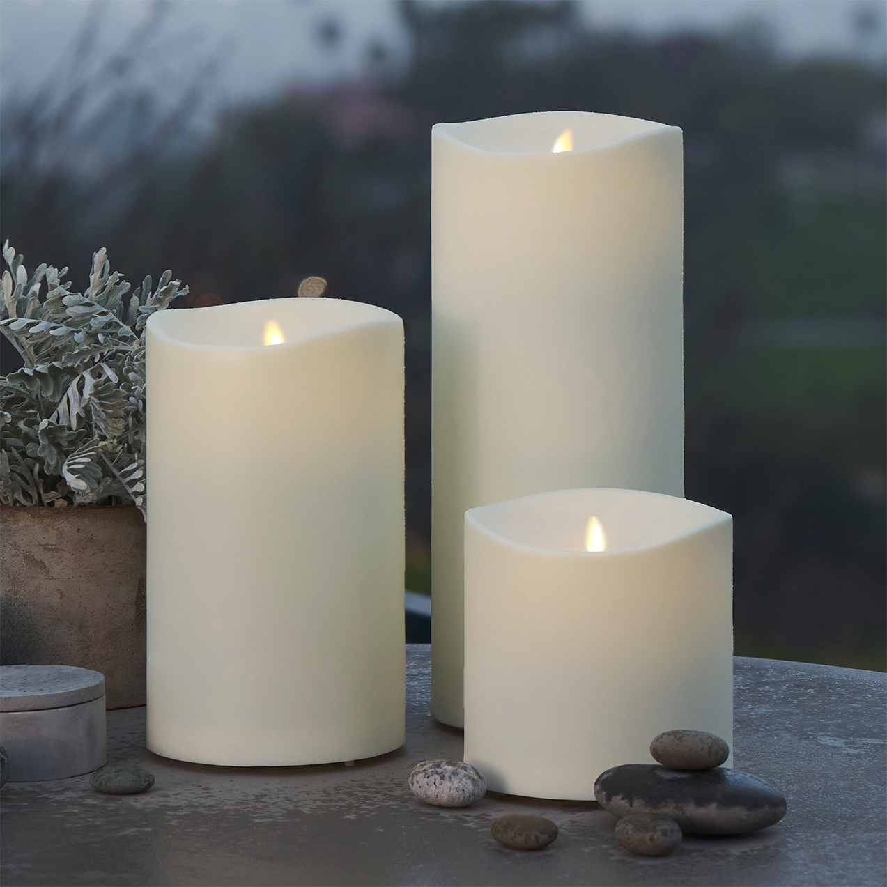 Pearl Ivory Outdoor Flameless Candle Grand Pillar with Remote - Melted Top