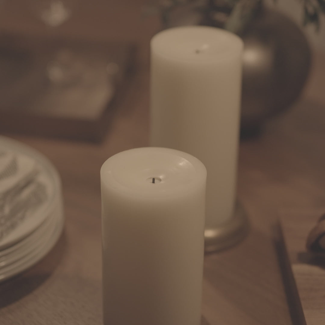 a video of Luminara's wick to flame pearl ivory flameless candles