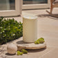 Pearl Ivory Outdoor Flameless Candle Grand Pillar with Remote - Melted Top