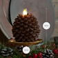 an image of Luminara's pine cone candles