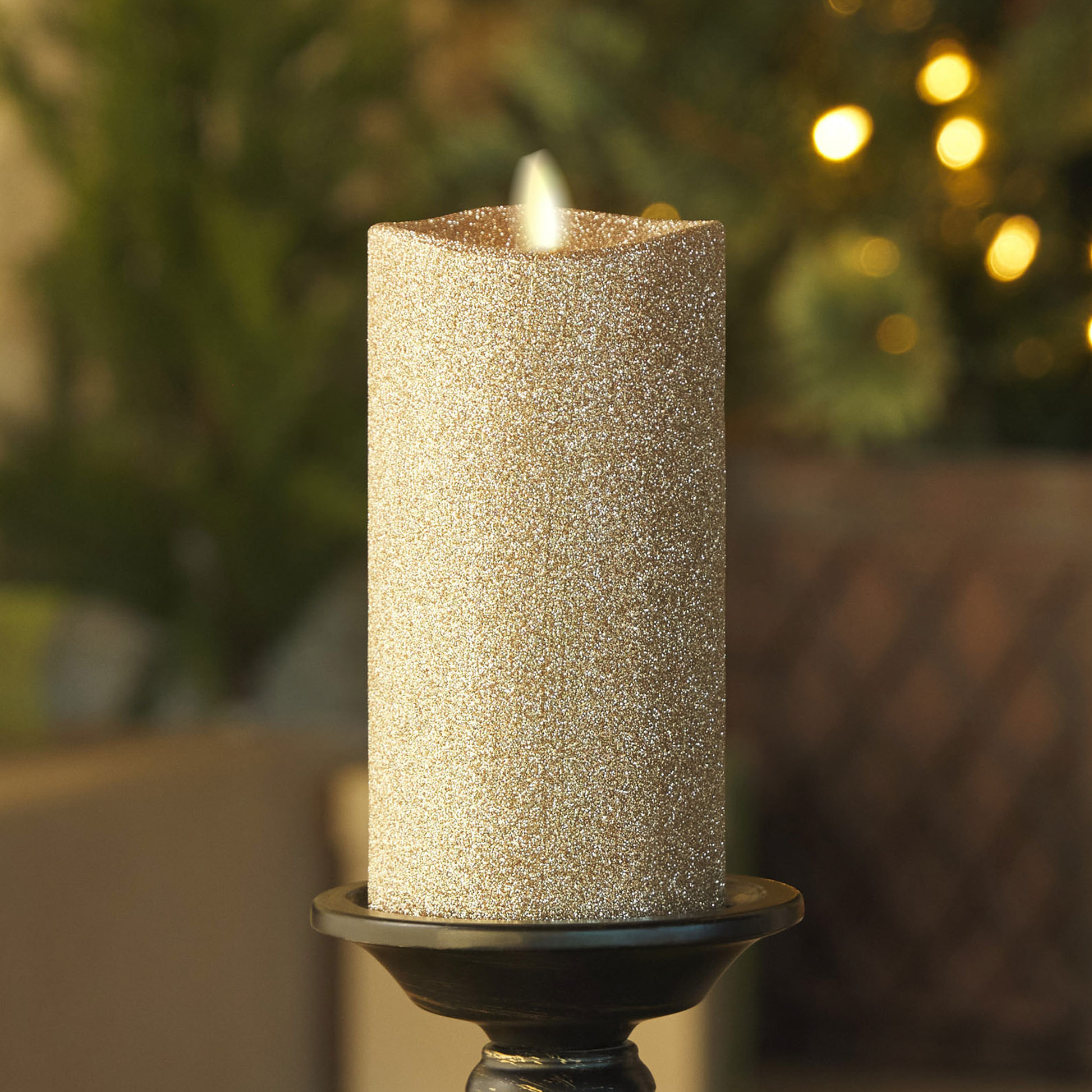 an image of Luminara's gold glitter candle