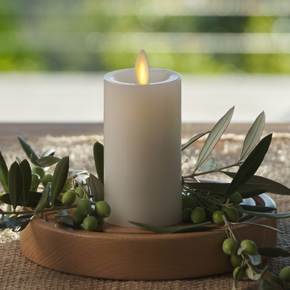 an image of our white Luminara candle