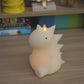 Whisper Green Color Changing Flameless Candle Dinosaur with Remote