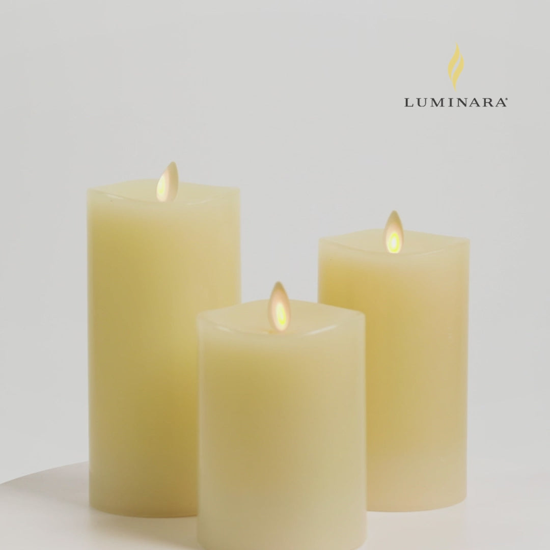 a video of Luminara's ivory flameless candle pillars