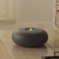 a video demonstrating Luminara's concrete candle holder