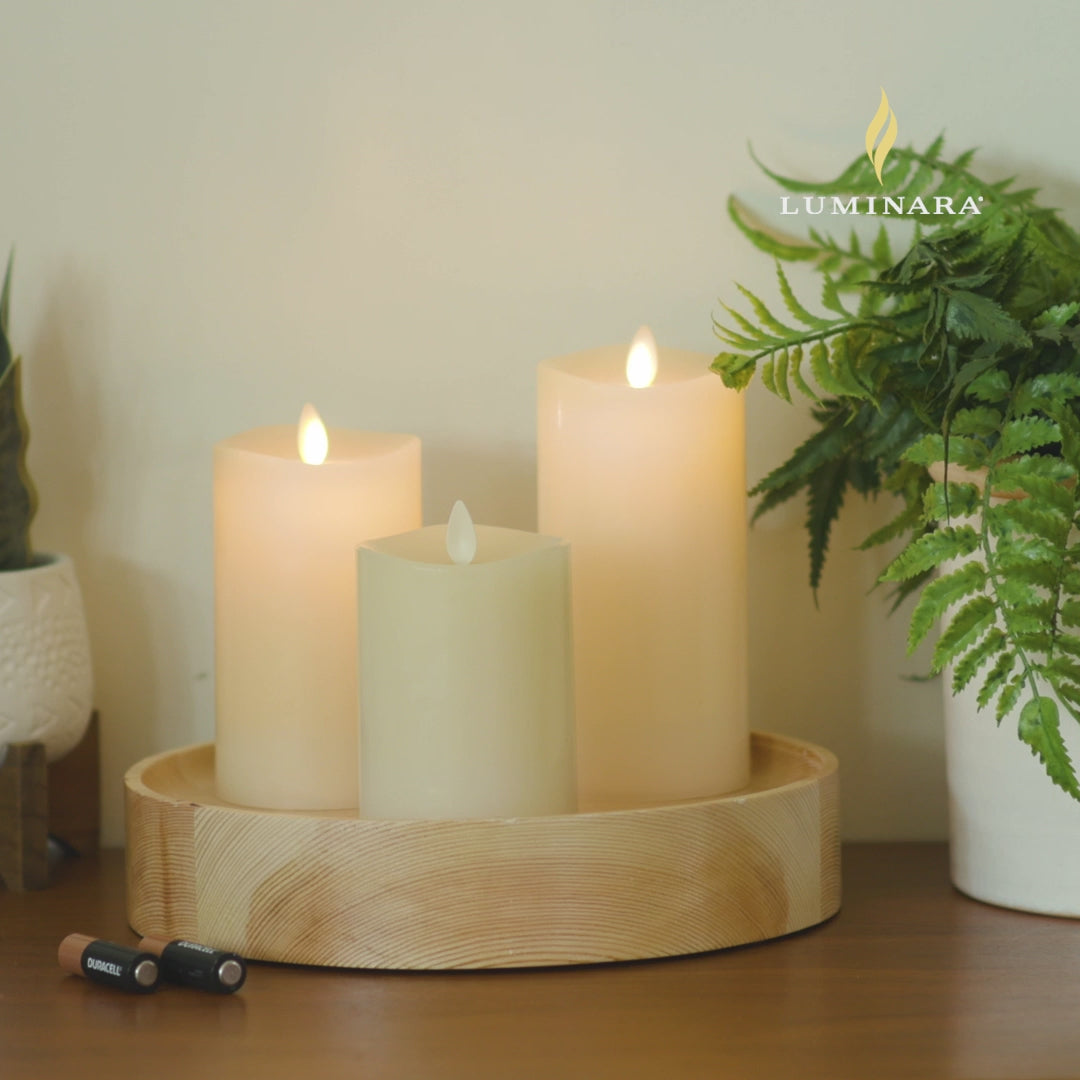 a video of Luminara's ivory flameless candle pillars